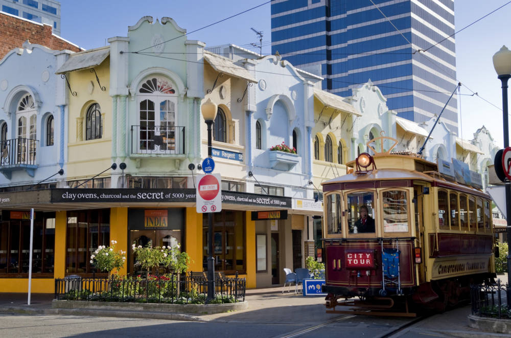 Historic tram passing through New Regent street, known for its Spanish mission-style architecture. [Image taken pre-2011 earthquake]